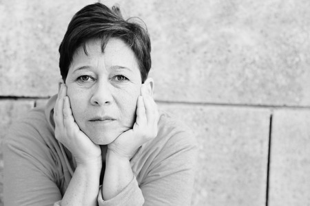 Portrait of beautiful 45 years old woman outdoorsの写真素材