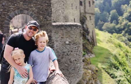 Portrait of father hiking with two kids in Germanyの写真素材