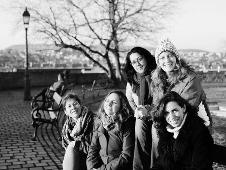 Outdoor portrait of happy woman walking on Budapestの写真素材