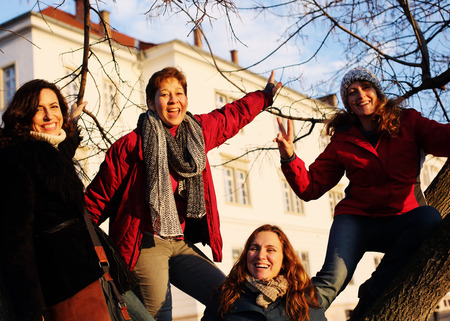 Outdoor portrait of happy woman walking on Budapestの写真素材