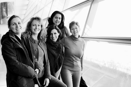 Portrait of beautiful five friends traveling togetherの写真素材