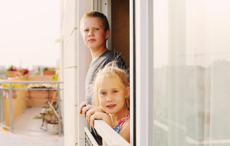 Portrait of autistic 9 years old boy with his 6 years old sisterの写真素材
