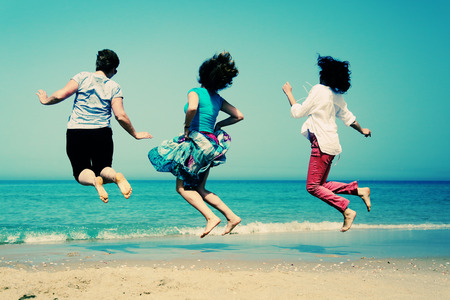Portrait of three 40 years old women on seasideの写真素材