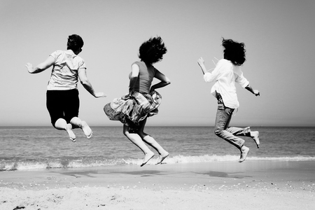Portrait of three 40 years old women on seasideの写真素材
