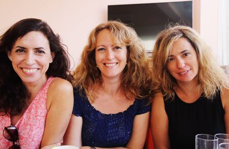 Closeup portrait of three  40 years old womanの写真素材