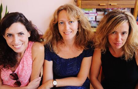 Closeup portrait of three  40 years old womanの写真素材