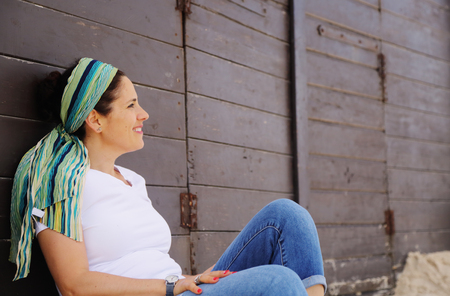 Portrait of beautiful 40 years old woman outdoorsの写真素材