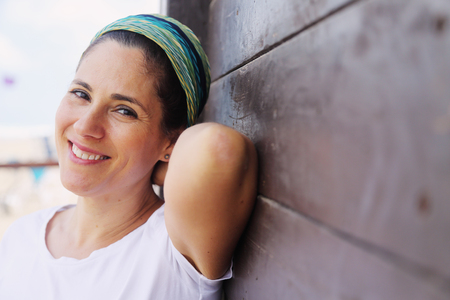 Portrait of beautiful 40 years old woman outdoorsの写真素材