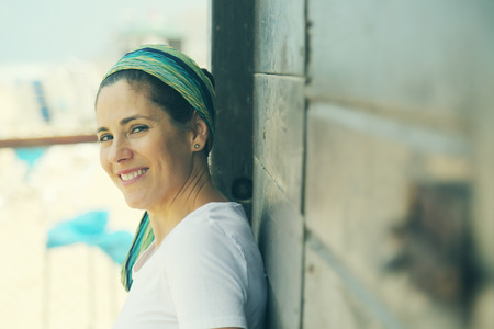 Portrait of beautiful 40 years old woman outdoorsの写真素材