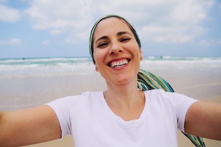 Portrait of beautiful 40 years old woman outdoorsの写真素材