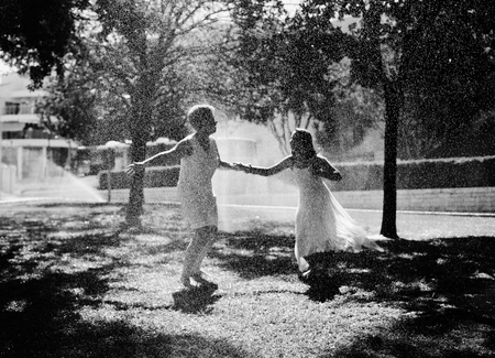 Mother and her daughter having fun in the park. Positive human emotions, feelings, joy.の写真素材