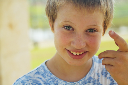 Close up portrait of emotion cute autistic boyの写真素材