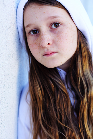 Portrait of beautiful teenage girl outdoorの写真素材