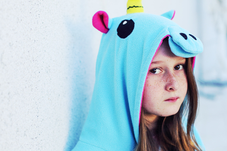 Portrait of beautiful teenage girl outdoorの写真素材