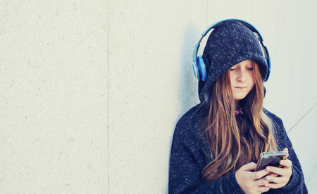 Portrait of 12 years old teenage girl outdoorの写真素材
