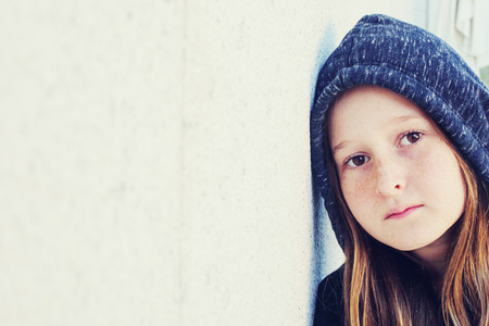 Portrait of 12 years old teenage girl outdoorの写真素材