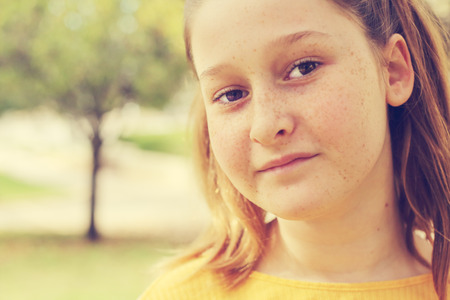 beautiful teenage girl meditates in nature
