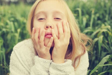 Portrait of girl enjoying of freedom fnd  summer. Ending coronavirus quarantine, out of covid-19 quarantine.の写真素材