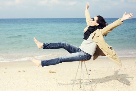 Portrait of 45 year old woman on the beachの写真素材