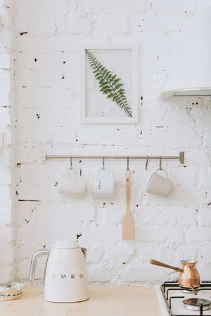 Vintage style white kitchen with kettleの写真素材