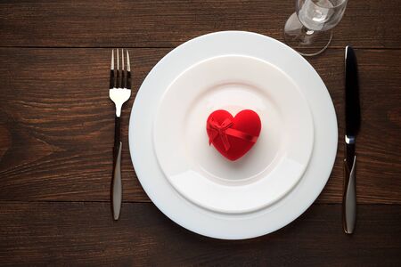 Festive table setting for Valentines day on rustic wooden table. Top view, copy space.の写真素材