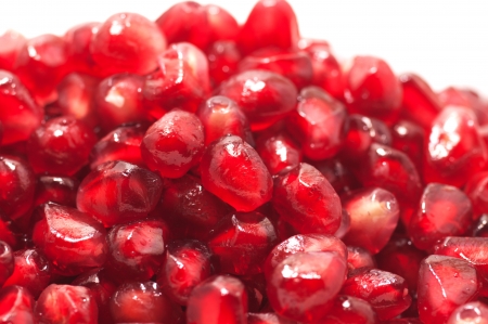 Pomegranate seeds close-up with frostの写真素材