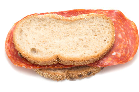 Salami sandwich on white backgroundの写真素材