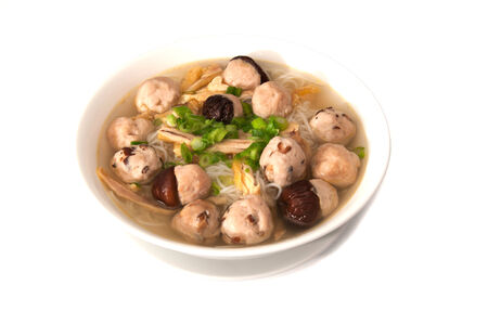 Vietnamese bun moc soup on white 