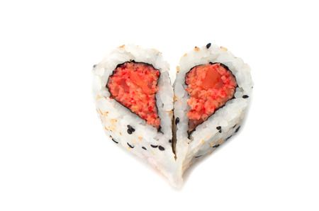 Sushi forming heart shape on white の写真素材