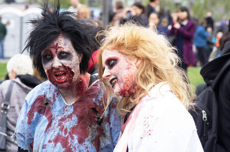 MONTREAL, QUEBEC, CANADA - OCTOBER 25 - Montreal Zombie Walk. A zombie walk is a public manifestation, where participants walk around dressed as zombies and have zombie makeup - 2014/10/25のeditorial素材
