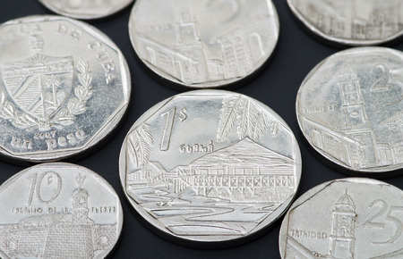 Series of Cuban coins on black backgroundの写真素材
