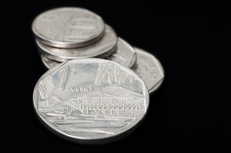 Series of Cuban coins on black backgroundの写真素材