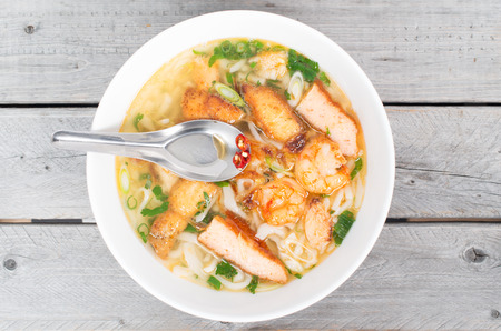 Banh Canh, Vietnamese traditional soup with big rice noodles and spicy fish sauce