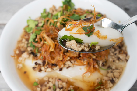 Bowl of northern Vietnamese non glutinous rice cake with ground pork, Banh Duc Nong Thitの写真素材