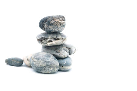 A funny stone that looks like the Godzilla in white background.の写真素材