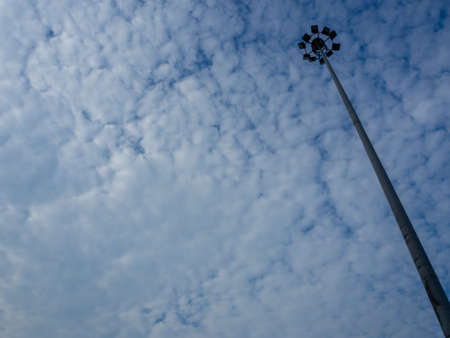 Street lamp post isolated on blue sky backgroundの写真素材