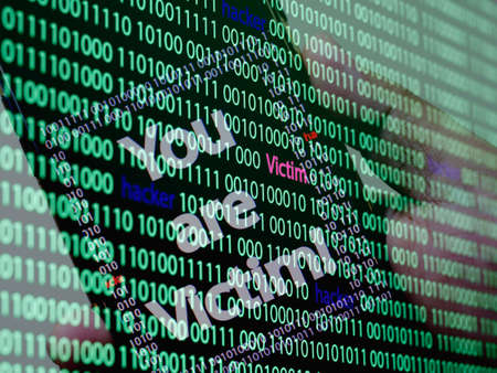 Computer screen shot with binary code and smartphone, great concept for technology computer and online securityの写真素材