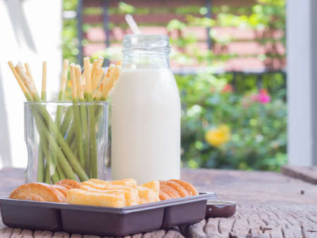 Morning with  breakfast,soy milk biscuit and bread on the tableの写真素材