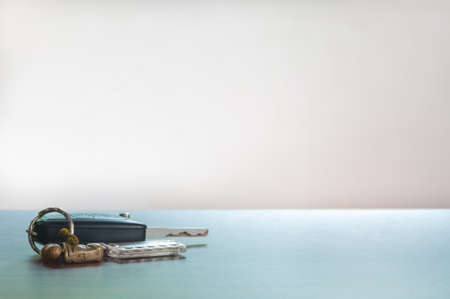 Car key isolated on the wooden tableの写真素材