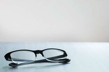 The glasses isolated on the wooded tableの写真素材