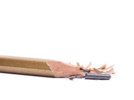 Closeup pencil with a broken tip on white  backgroundの写真素材