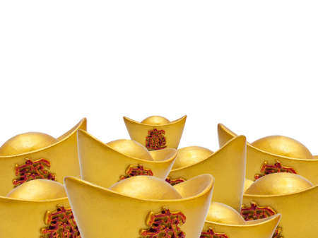 Chinese new year ornament,Stack of chinese gold on white background.の写真素材