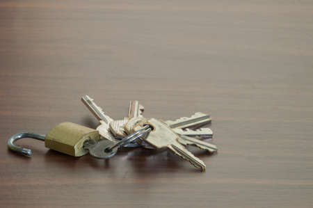 the wooden table,Keychain on the table background