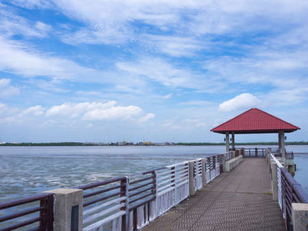 Waterfront pavilion with cloud in holiday times,Blue sky in the morning timesの写真素材