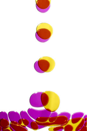Abstract color oil drop in water,Mix color oil on white backgroundの写真素材