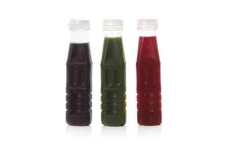 Tiger herbal juice,orange juice and grape juice isolated on white backgroundの写真素材