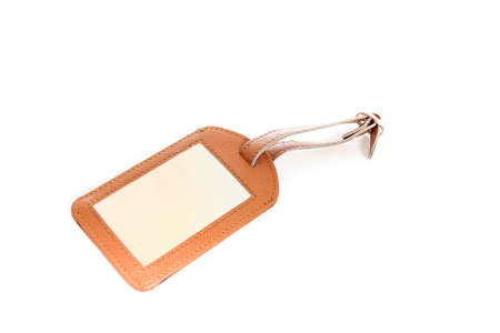 Brown leather label tag with string, isolated on the whiteの写真素材
