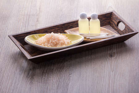 SPA and wellness - towel, salt, white wood backgroundの写真素材