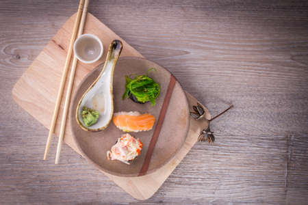 japanese sushi set on old wood background