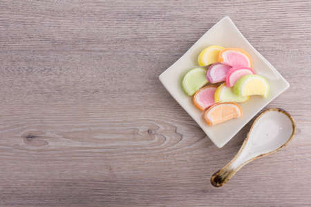 jelly sweet candy on wood backgroundの写真素材